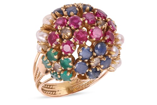 Lot 100 - A gem-set bombe ring, comprising claw-set...
