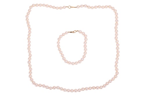 Lot 205 - Tasaki - A cultured Akoya pearl neckalce and...