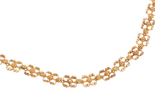 Lot 112 - A fancy-link chain, featuring a series of...
