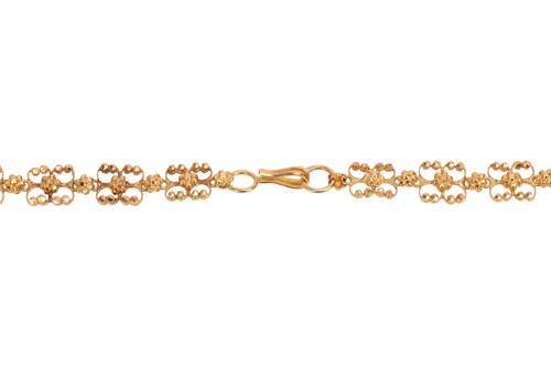 Lot 112 - A fancy-link chain, featuring a series of...