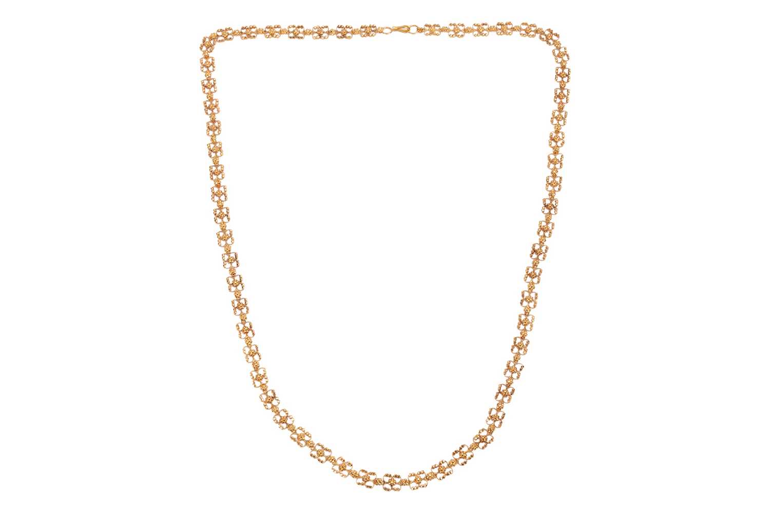 Lot 112 - A fancy-link chain, featuring a series of...