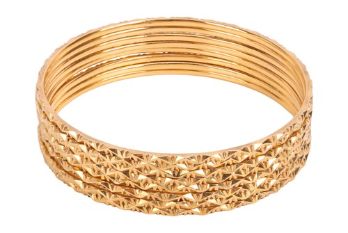 Lot 111 - A group of eight closed bangles, each...