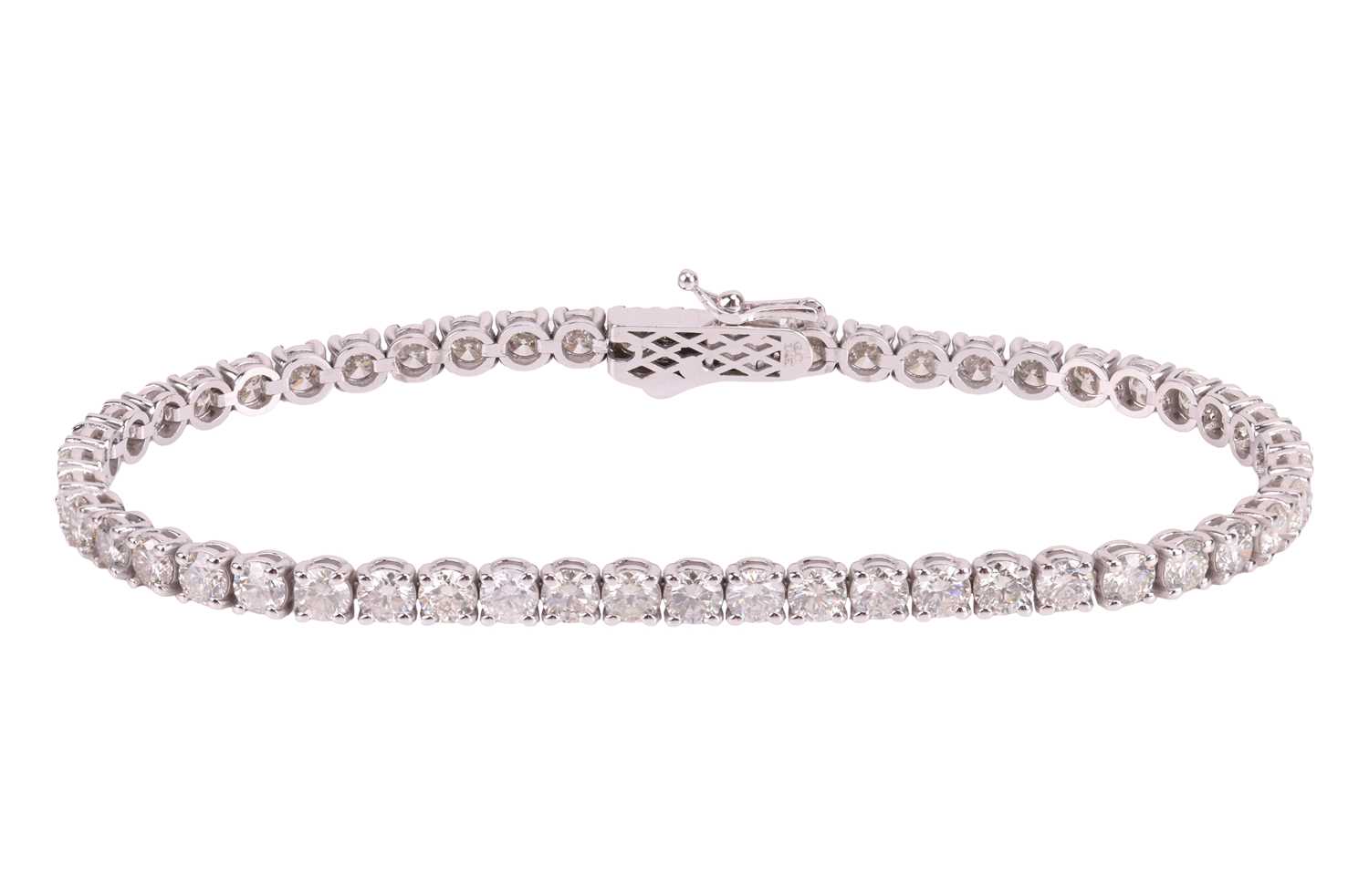 Lot A diamond line bracelet, comprising fifty-one...
