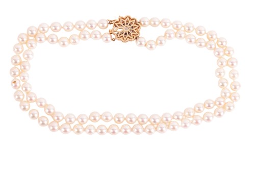 Lot 207 - Carl Bucherer - A double-row cultured pearl...