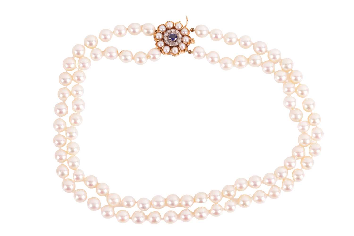 Lot 207 - Carl Bucherer - A double-row cultured pearl...