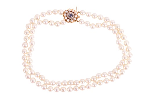 Lot Carl Bucherer - A double-row cultured pearl...