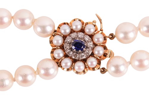 Lot 207 - Carl Bucherer - A double-row cultured pearl...