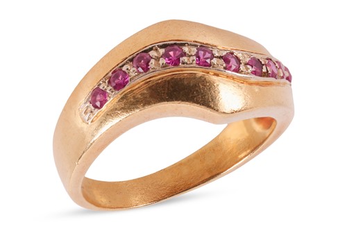 Lot A ruby-set dress ring, comprising a central...