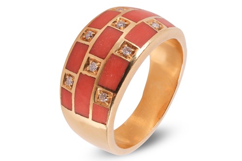 Lot A coral and diamond dress ring, the wide band...