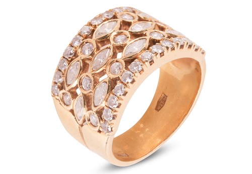 Lot 115 - A diamond-set dress ring, comprising three...