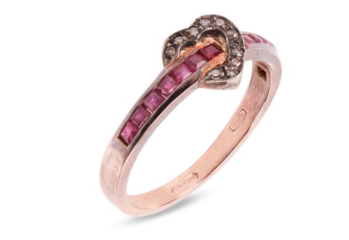 Lot 2 - A ruby and diamond heart ring, the central...