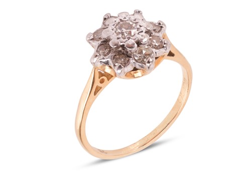 Lot 76 - A diamond cluster ring, set with old-cut...