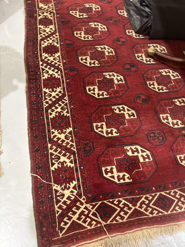 Lot 69 - An Ersari main carpet with four rows of ten...