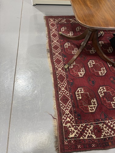 Lot 69 - An Ersari main carpet with four rows of ten...