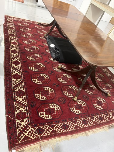 Lot 69 - An Ersari main carpet with four rows of ten...