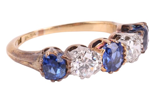 Lot 45 - A diamond and sapphire half-eternity ring,...