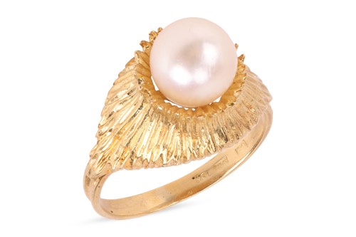 Lot 69 - A cultured pearl cocktail ring, featuring a...