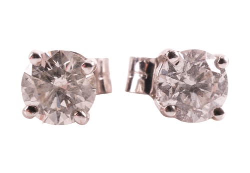 Lot A pair of diamond stud earrings, each stud...