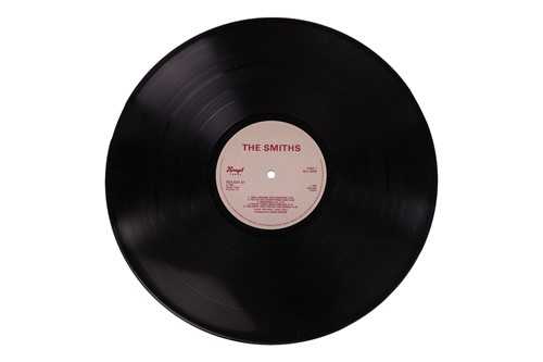 Lot 173 - The Smiths: a band-signed copy of their 1984...
