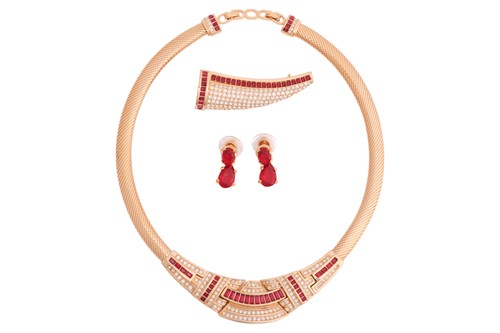 Lot 141 - Christian Dior - a red and white paste-set...