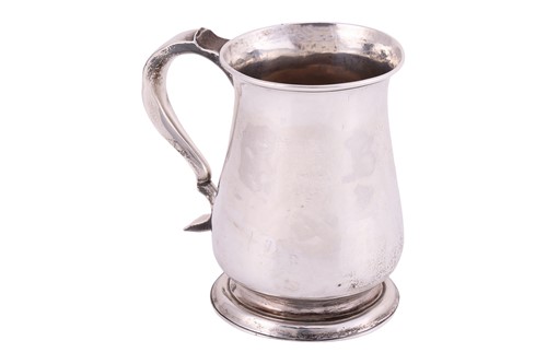 Lot A George II tankard, low bellied with...