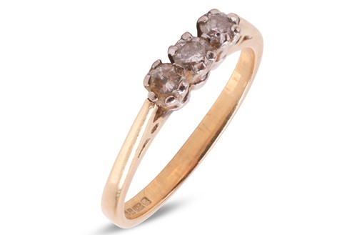 Lot 70 - A diamond three-stone ring, the three round...