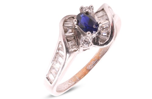 Lot 2 - A sapphire and CZ cluster ring, comprising a...