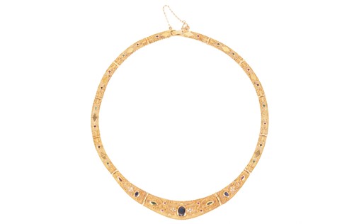 Lot 196 - A sapphire, ruby, emerald and CZ jewellery...