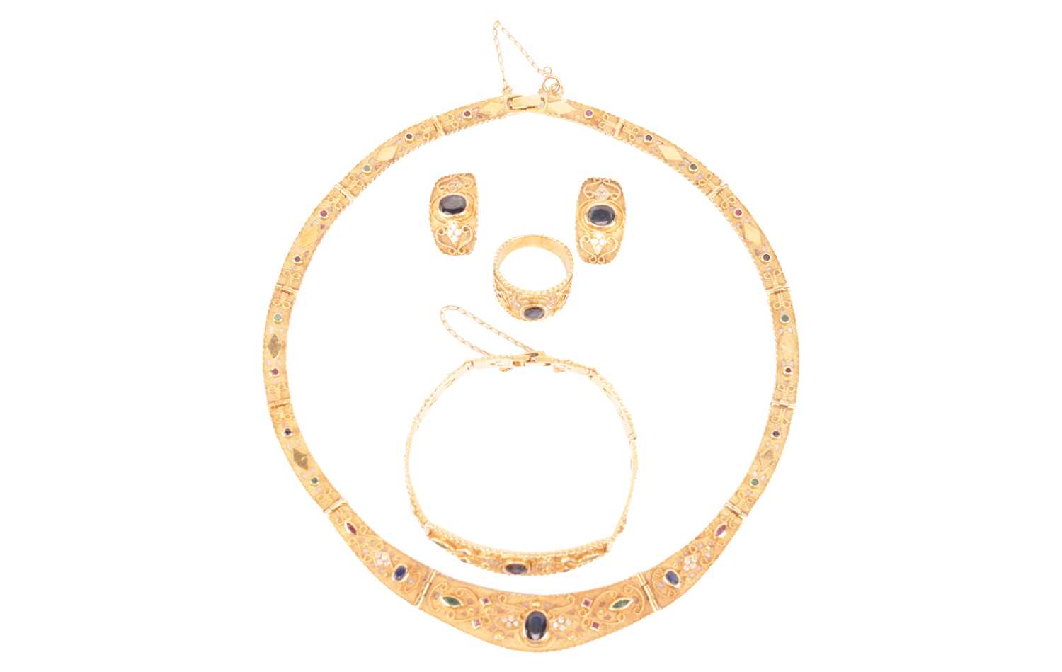 Lot 196 - A sapphire, ruby, emerald and CZ jewellery...
