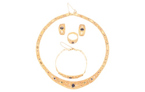 Lot 196 - A sapphire, ruby, emerald and CZ jewellery...