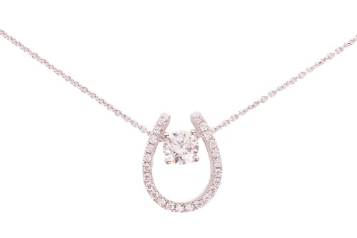 Lot 186 - A diamond pendant necklace, centrally claw-set...