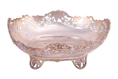 Lot A silver fruitbowl, oval with pierced fruiting...
