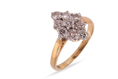 Lot 126 - A navette shaped diamond cluster ring,...