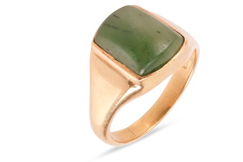 Lot 86 - A nephrite signet ring in 18ct gold,...