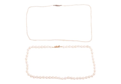 Lot 69 - Two cultured pearl necklaces, the line of...