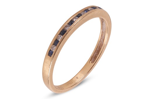 Lot 127 - An sapphire & diamond half eternity ring,...