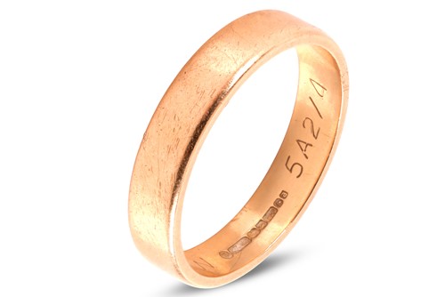 Lot 55 - An 18ct gold band ring, 4.0mm in width,...