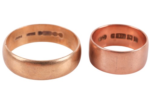 Lot 85 - Two 9ct gold band rings; the first in yellow...