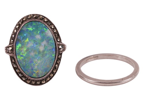 Lot 9 - An opal doublet dress ring, the oval doublet...