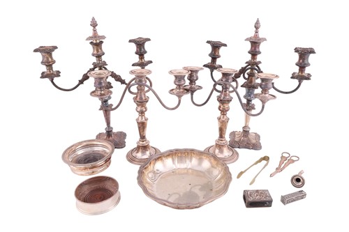 Lot 211 - A pair of silver plated three light candelabra,...