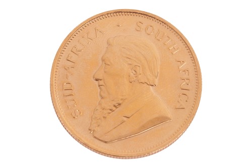 Lot 179 - A South African 1oz Krugerrand, dated 1980, 34....