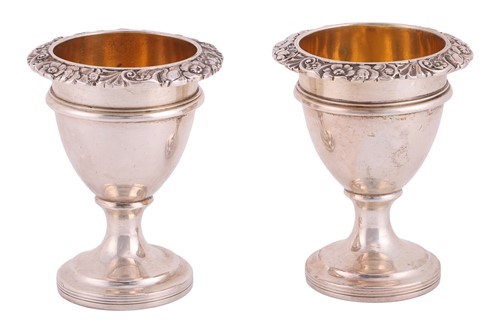 Lot A pair of George IV silver egg cruets, by...