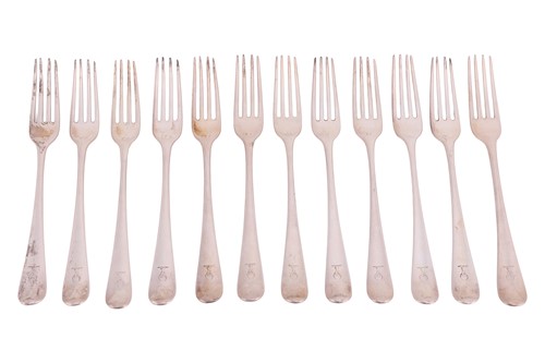 Lot 278 - Twelve George III silver table forks, London...