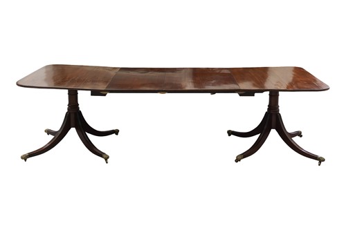 Lot A Victorian mahogany two-pillar dining table,...