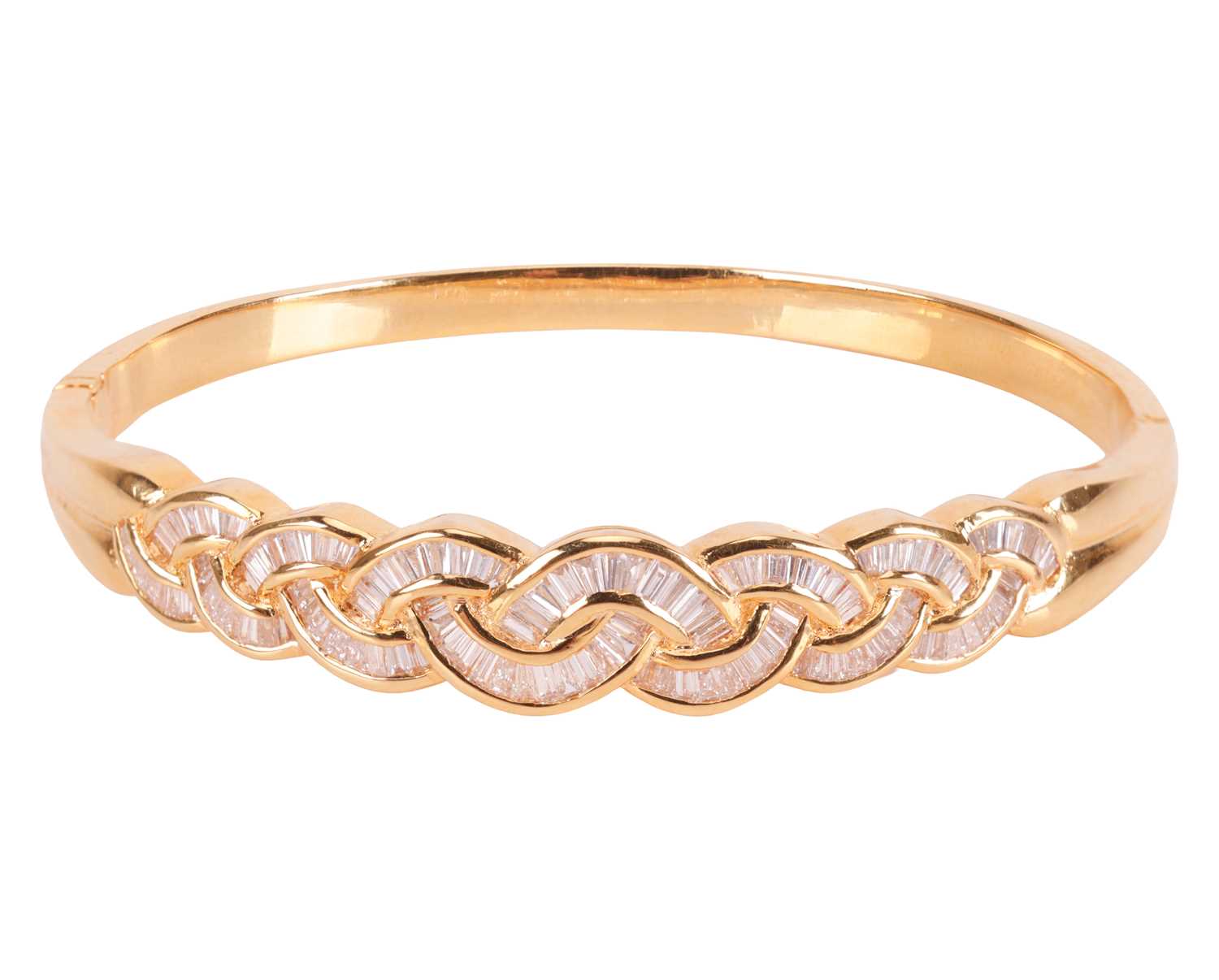 Lot 148 - A diamond set bangle, designed as a series of...