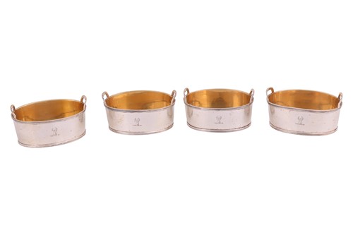 Lot A set of four George III silver oval tub salts,...