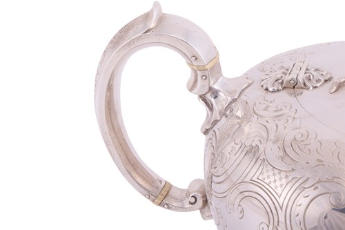 Lot 256 - A Victorian silver three-piece tea service by...
