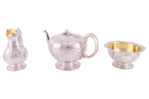 Lot 256 - A Victorian silver three-piece tea service by...