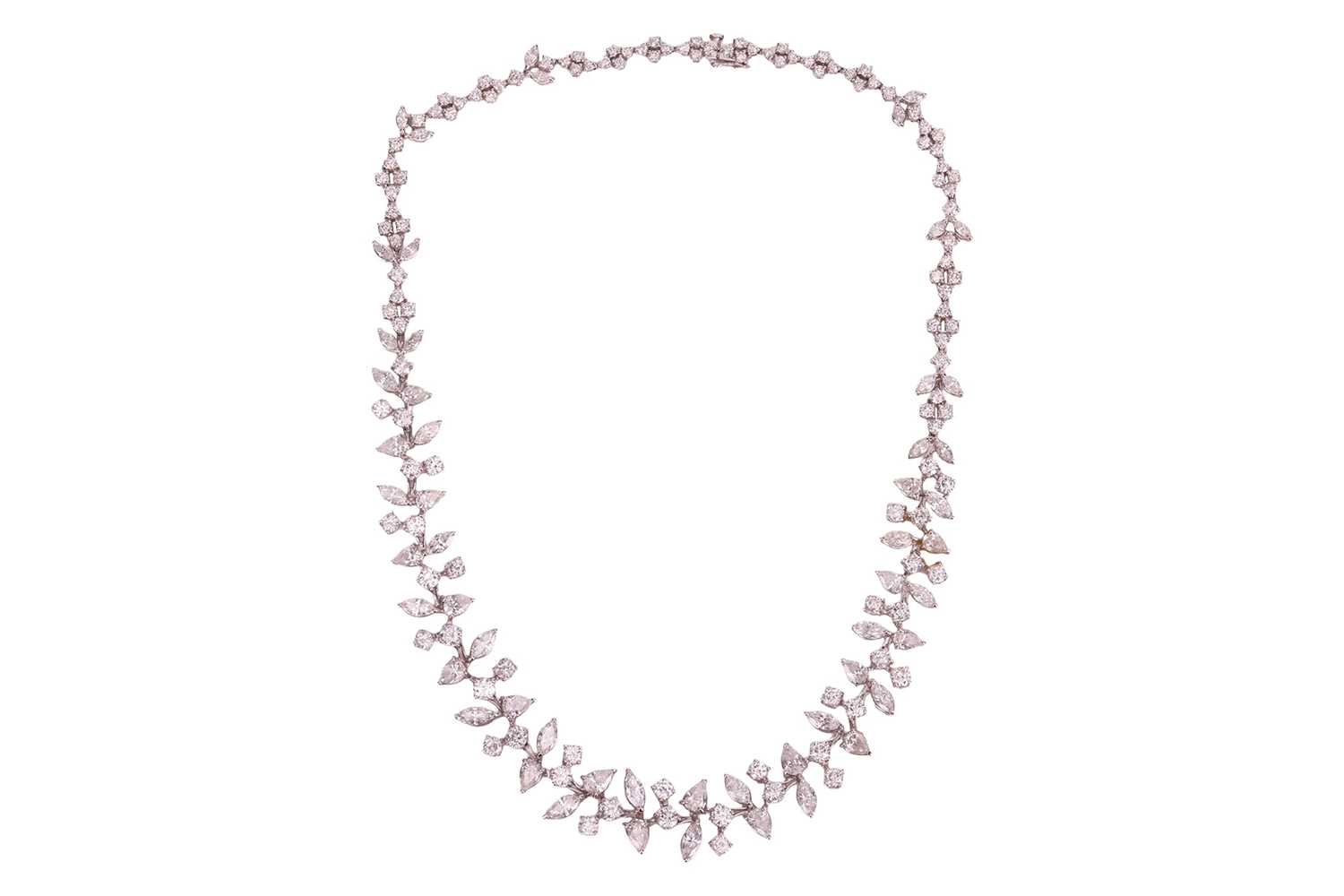 Lot A diamond-set necklace of abstract foliate...