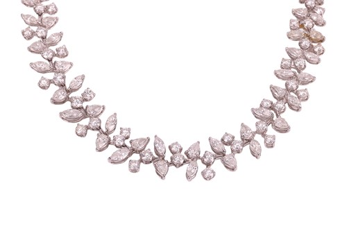 Lot A diamond-set necklace of abstract foliate...